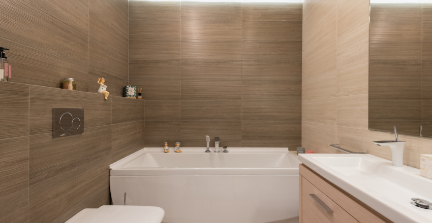 Finished bathtub with new faucet and drain hardware