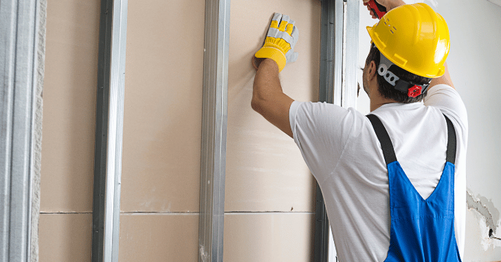 Cutting an outlet opening in a drywall sheet